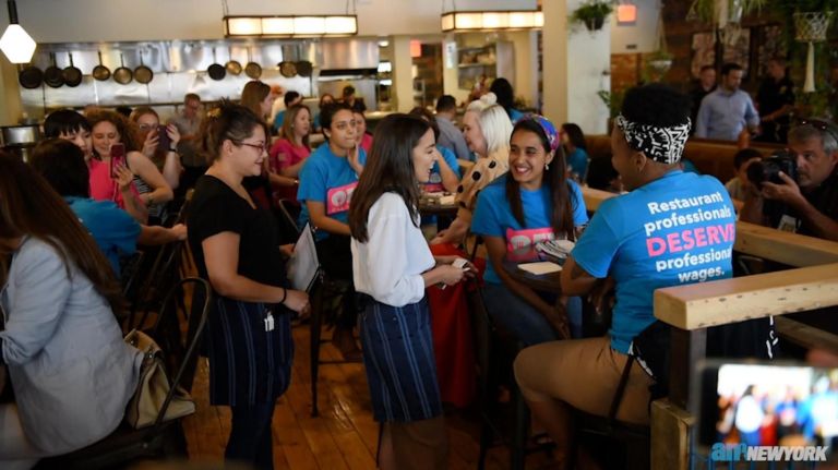 AOC makes guest bartender appearance at The Queensboro