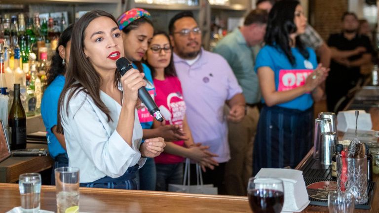 AOC bartends in Queens in support of One Fair Wage for tipped workers 3 "Any job that pays $2.13 an hour is not a job. It's indentured servitude," Ocasio-Cortez told the crowd.