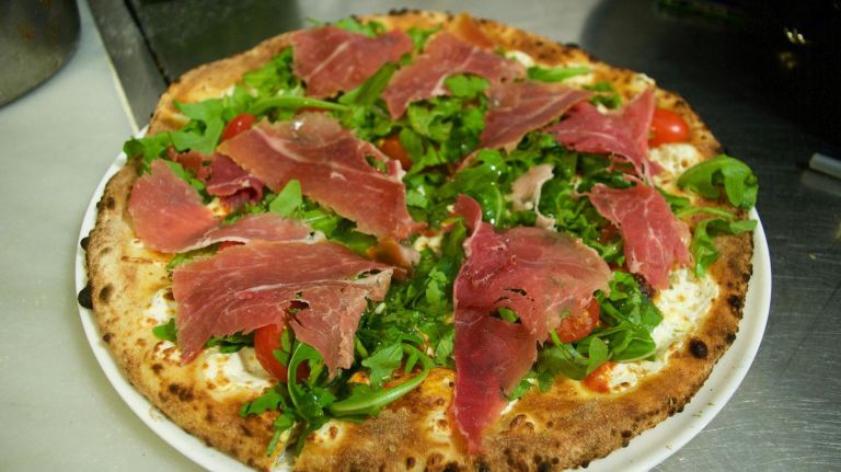 What to do and where to eat in Morris Park, east of the Bronx Zoo 9 Patricia's serves a packed dining room brick-oven, Neapolitan-style pies, including the crowd-favorite prosciutto pie ($18) with fior di latte mozzarella (as opposed to buffalo, this wet, fresh kind is made with cow's milk), arugula, cherry tomatoes and chilled slices of dry-cured ham imported from Parma.
