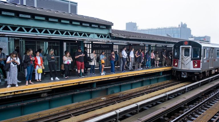 A Manhattan-bound 7 train pulls into the Court Square stop in Long Island City.