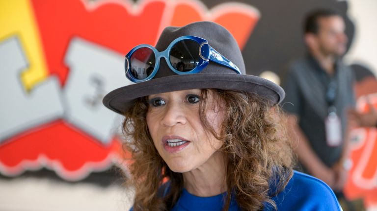 'Beyond the Streets' exhibit displays sweeping overview of street artists 3 Actress Rosie Perez pays a visit to a press preview of the exhibit Thursday.