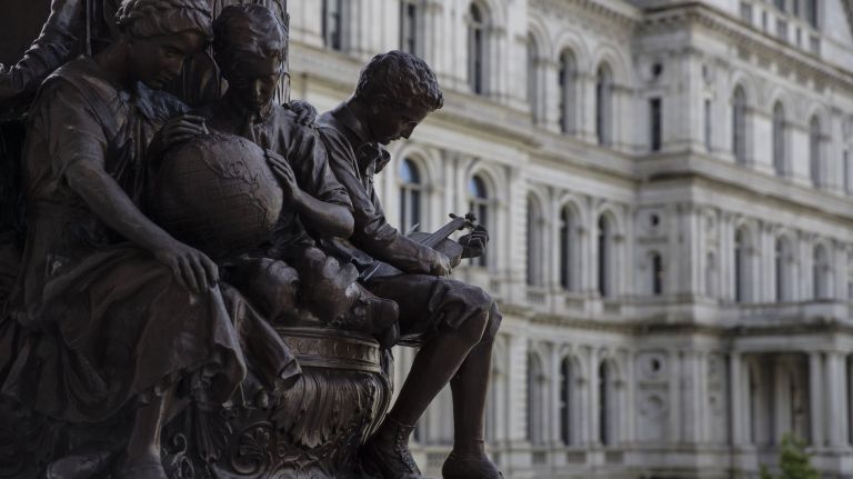 A statue stands beside the New York State Capitol building in Albany on&nbsp;May 22, 2019.