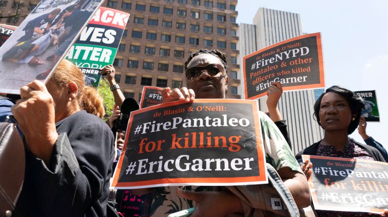 Eric Garner supporters protest outside of One Police Plaza on June 6, the last day of the departmental trial of NYPD Officer Daniel Pantaleo.