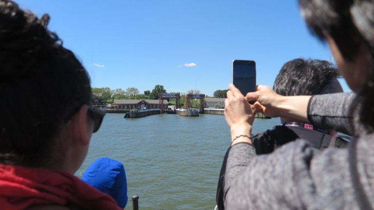 Enjoy a coffee and the view aboard the ferry.