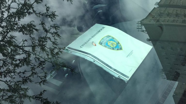 NYC cracks down on phony parking placards 2 A printed booklet on the dashboard of a car prominently features an NYPD shield and reads "civilian handbook." Such tokens are often placed on the dashboards of illegally parked cars in lieu of a proper parking placard in hopes of avoiding a ticket.