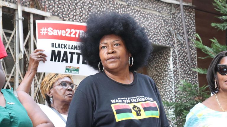 About a dozen community members gathered outside 227 Duffield St. on July 25&nbsp;to protest the demolition of the building, which they say deserves landmark status and should be turned into a museum.&nbsp;