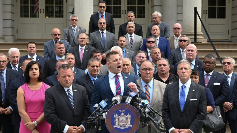 Throwing water at police would be a felony under bill by state lawmakers 2 Throwing water at police officers would become a felony crime under a new bill announced by Assemb. Mike LiPetri , center, and Assemb. Michael Reilly, left, at City Hall on Wednesday.