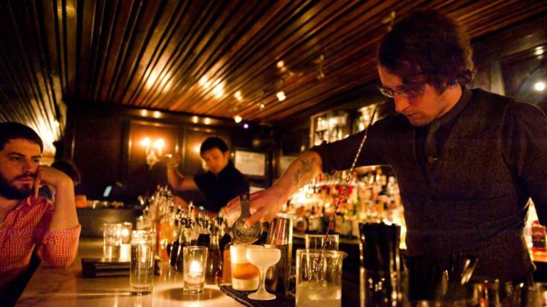 Exploring the culture of the East Village, a longtime haven for the arts 14 Bartender Thomas Waugh mixes up a pair of cocktails for patrons at Death & Co.