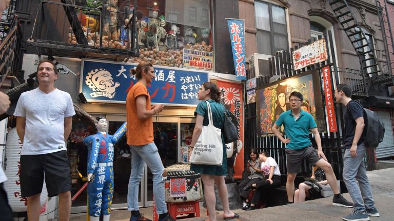 Exploring the culture of the East Village, a longtime haven for the arts 3 Patrons wait for a table outside the Taishu Izakaya Kenka Japanese restaurant on St. Marks Place in the East Village on Wednesday.