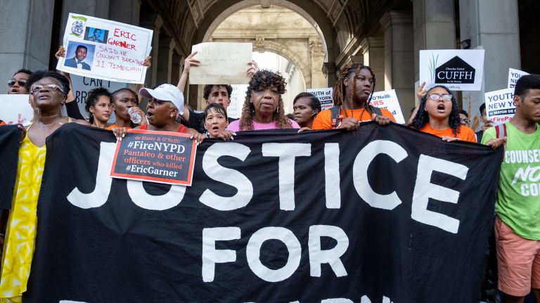 Eric Garner's mother,&nbsp;Gwen Carr, and other activists attended a rally and march&nbsp;from Foley Square to One Police Plaza in Manhattan on Wednesday to mark the fifth anniversary of her son's police-involved death on Staten Island.