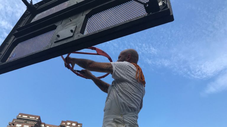 Artist Jeremy John Kaplan is putting up basketball nets around the city.