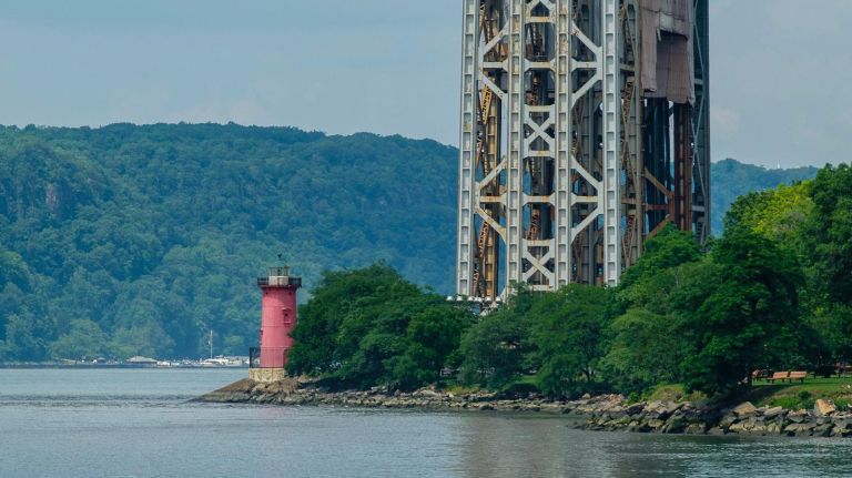 The "Little Red Lighthouse" sits under the George Washington Bridge.