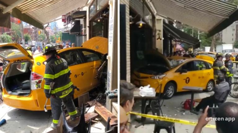 Taxi crashes into building in Manhattan, injuring 8, FDNY says 2 A taxi crashed into a restaurant in Hell's Kitchen Thursday.
