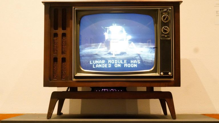 'Apollo's Muse' photo exhibition celebrates 50th anniversary of the moon landing 3 A vintage television plays CBS News Television's coverage of Apollo 11 moon landing in 1969.