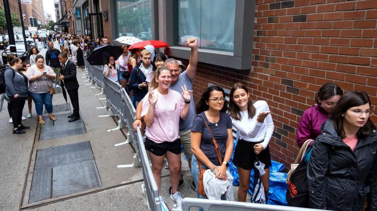 Fans waited in the rain for the chance to shop the Taylor Swift pop-up in Chelsea. 