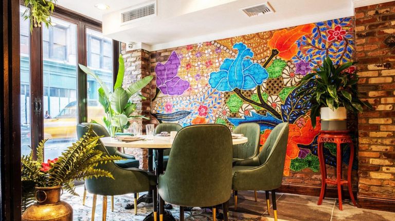 Godiva Café brings Belgian chocolate heat and more NYC restaurant openings 4 Laut Singapura seeks to bring an authentic Malaysian feel to complement its authentic Malaysian food, with a brightly colored dining area filled with greenery.