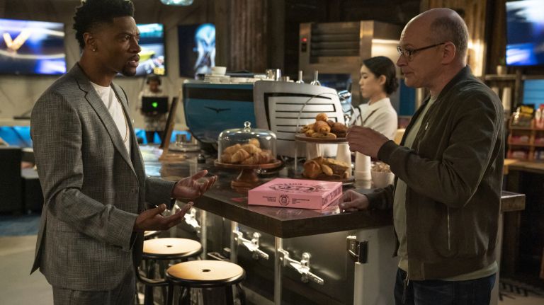 London Brown, left, stars as Reggie, and Rob Corddry as Joe Krutel, in HBO's 