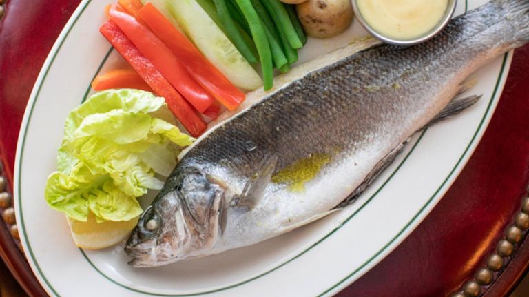 These iconic restaurants still deliver the classic NYC experience 9 The branzino with vegetables at Pastis.