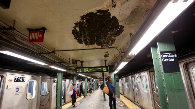 A hole in the ceiling is visible on the platform for the 4 and 5 trains at the Atlantic Avenue station on Sept. 25, 2018.