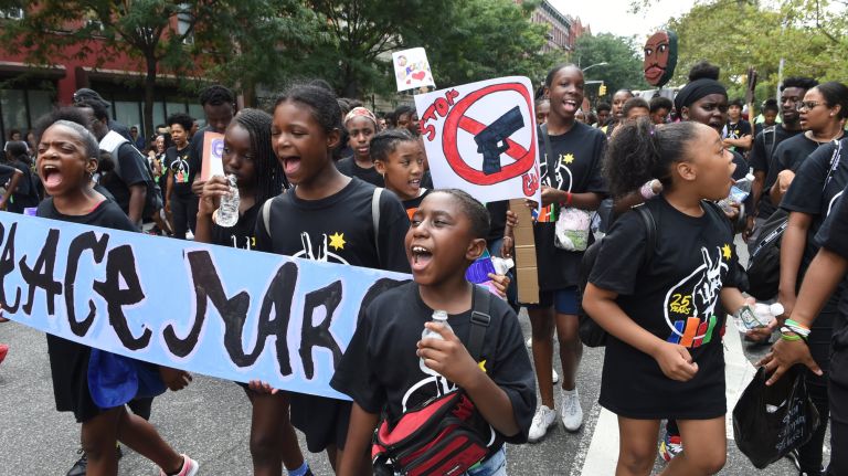 Children's March for Peace in Harlem draws thousands 4 The nonprofit Harlem Children's Zone led the march to the Harlem Armory.
