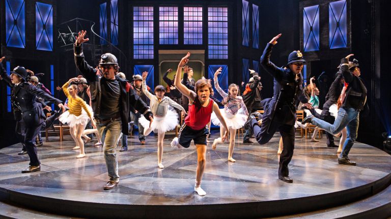 Nolen Dubuc (center) as Billy Elliot with members of the company in "Billy Elliot."