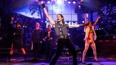 Mitchell Jarvis, center, stars in Off-Broadway's "Rock of Ages."