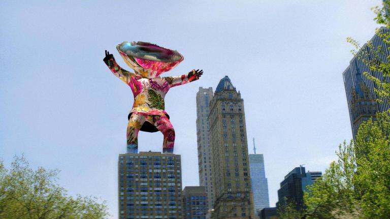 Central Park's the canvas for augmented reality art walk 4 Nick Cave's "Soundsuits" appears to stand on top of a building during the art walk.
