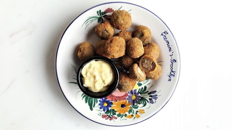 Paloma at Hotel Hendricks launches and more NYC restaurant openings 5 Italian couple Riccardo Massetti and Elena Salati moved to New York City to share the flavors of Italy's Le Marche region with as many people as possible at Cremini's, offering a menu full of unique dishes, such as fried stuffed olives and fried custard cream.