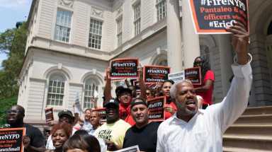 Activists deliver 61k petitions to fire cops in civilians’ deaths