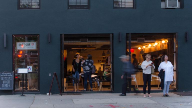 From cafe to bar: NYC coffee shops get a new buzz with cocktail service 4 East One Roasters' flagship shop in Carroll Gardens recently extended kitchen hours and offers wine and beer.
