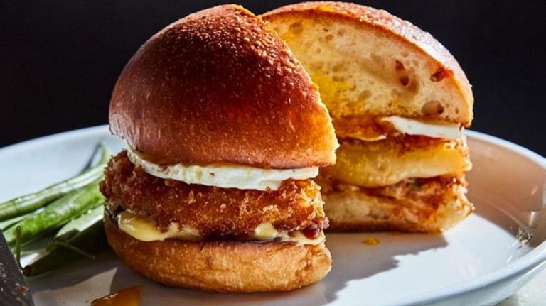 At Flora Bar, egg meets a swath&nbsp;of tomato chutney and slab of deep-fried caciocavallo cheese.