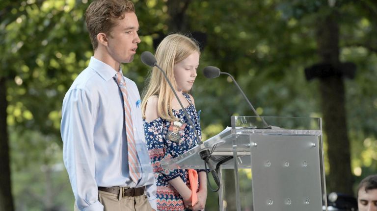 9/11 memorial ceremony at Ground Zero honors victims on 18th anniversary 4 Joey Henry, 13, and Alexis Barbara, 9, read the names of victims during the 9/11 memorial ceremony at Ground Zero on Wednesday. Henry's uncle, NYPD firefighter Joseph Henry, and Barbara's grandfather, FDNY chief Gerard Barbara, were killed in the terror attacks.