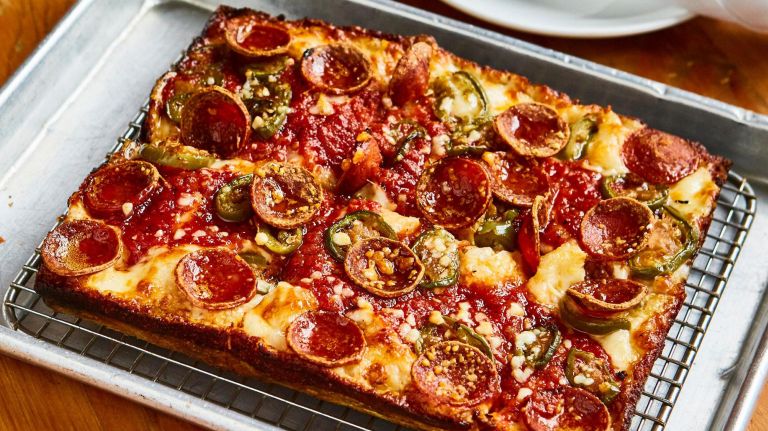 Where to find regional pizza styles in NYC, Chicago and Detroit included 6 Emmy Squared specializes in Detroit-style pies, including the Colony, with pepperoni, pickled jalapeños and honey.