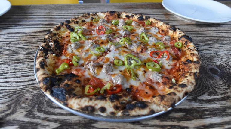 Where to find regional pizza styles in NYC, Chicago and Detroit included 4 Speedy Romeo serves up the Saint Louie, which includes the must-have Provel, a white processed cheese.