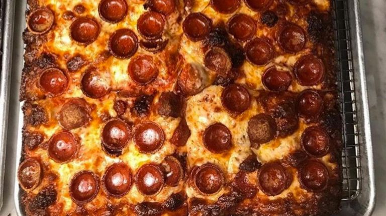 Where to find regional pizza styles in NYC, Chicago and Detroit included 7 Mama's Too! has a pizza case filled with Sicilian-style options, including pepperoni.