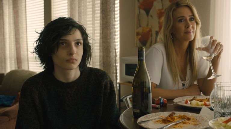 Finn Wolfhard as Young Boris and Sarah Paulson as Xandra in "The Goldfinch."