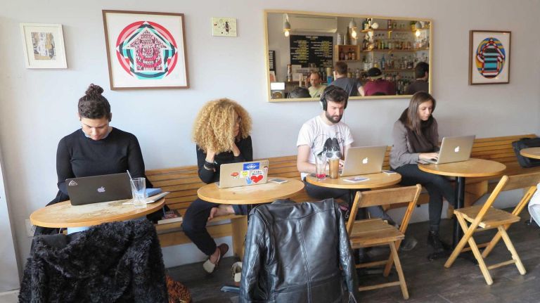 Sunrise/Sunset's brunch menu includes braised beef hash, multigrain pancakes and a brunch burger with a fried egg, and the day menu includes a chipotle chicken sandwich, a salmon sandwich, the Sunset Burger, penne boscaiola and more.