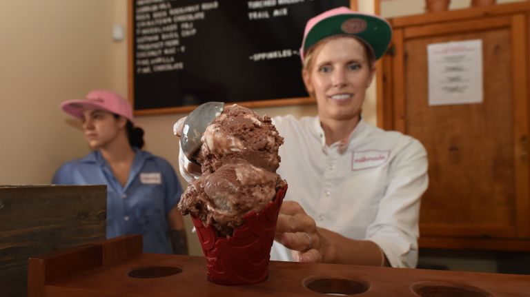 Diana Hardeman, owner of MilkMade, crafts a cone with&nbsp;smoked chocolate s'mores ice cream.