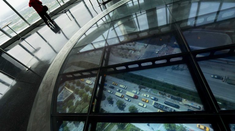 The Sky Portal, center right, shows real-time views of the streets below the 100th level from One Word Observatory at One World Trade Center Wed., May 20, 2015. The observatory opens officially, May 29.