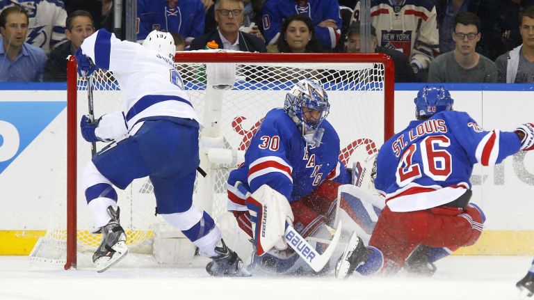 Tyler Johnson #9 of the Tampa Bay Lightning scores a first-period shorthanded goal against Henrik Lundqvist #30 of the New York Rangers during Game 2 of the Eastern Conference finals at Madison Square Garden on Monday, May 18, 2015.