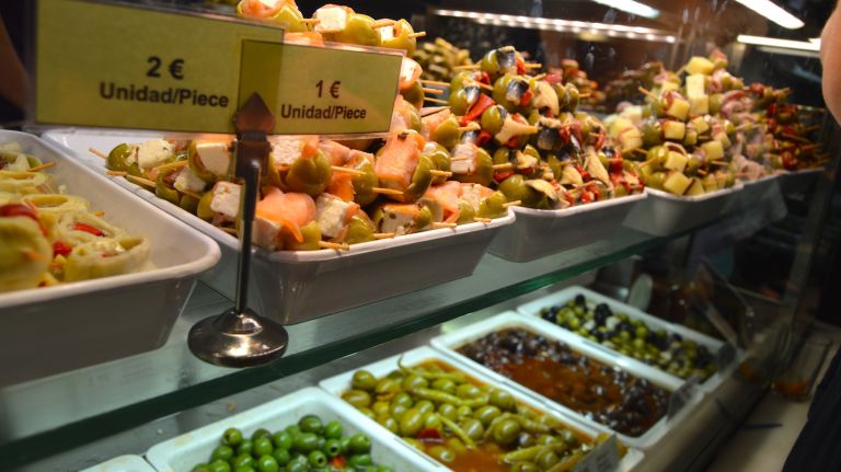 If you want to take a small break from eating bread, meat and cheese, grab a glass of wine at Pinkleton & Wine (Nos. 68, 69, 70 and 71) and head to La Hora del Vermut (Nos. 22, 23, 24 and 25) to choose a variety of pickled products, like olives and pickle skewers. Or, as the name states, you can skip the wine and drink vermouth from this stand instead. The olive combinations at 1-2 euros per piece aren't necessarily cheap, but they are definitely worth trying. Some are spicy, others are sweet, some have peppers, others have anchovies; the combinations and seasonings are unexpected but perfect. Sit (or stand) for a while and nosh on these treats while you enjoy a nice drink and think about all the perfect things you have ingested so far. 