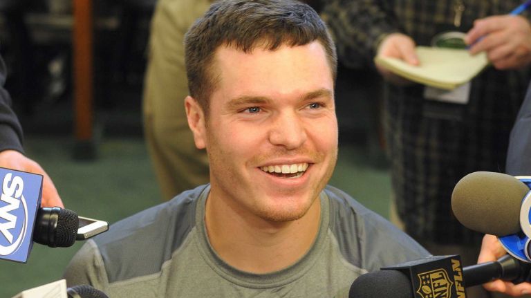 New York Jets rookie camp invitee / TE Mike Flacco, brother of Baltimore Ravens quarterback Joe Flacco, has a laugh as he speaks with the media during Day 1 of rookie minicamp held at Atlantic Health Jets Training Center in Florham Park, N.J. on Friday, May 8, 2015.