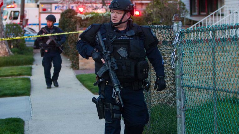 In the evening of May 2, 2015, police officers conducted an intense search for the suspect in the shooting of an NYPD officer. 