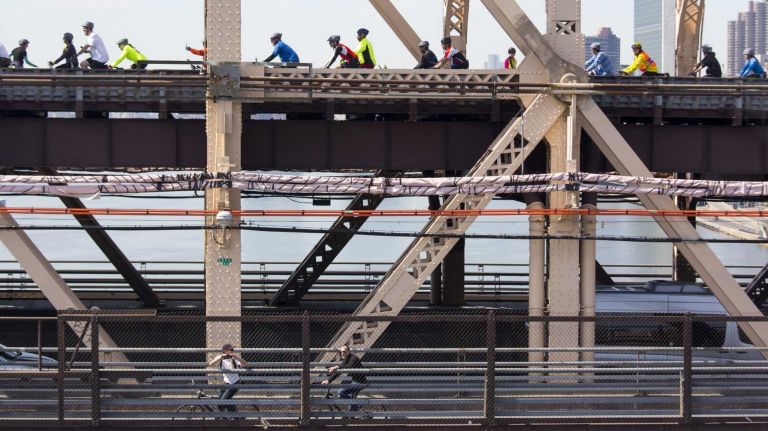 Participants move across the Ed Koch Queensboro Bridge as they take part in the Five Boro Bike Tour Sunday, May 3, 2015.