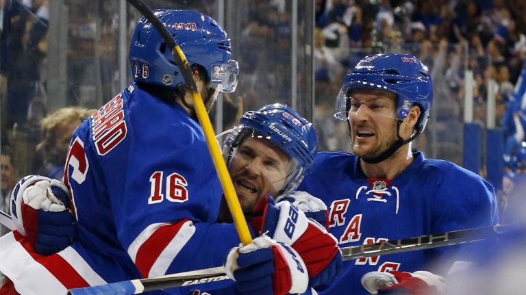 Rangers vs. Capitals: Game 2 of round 2 of Stanley Cup playoffs 22 Derick Brassard #16 of the New York Rangers celebrates his third-period goal against the Washington Capitals with his teammates during Game 2 of the Eastern Conference semifinals at Madison Square Garden on Saturday, May 2, 2015.