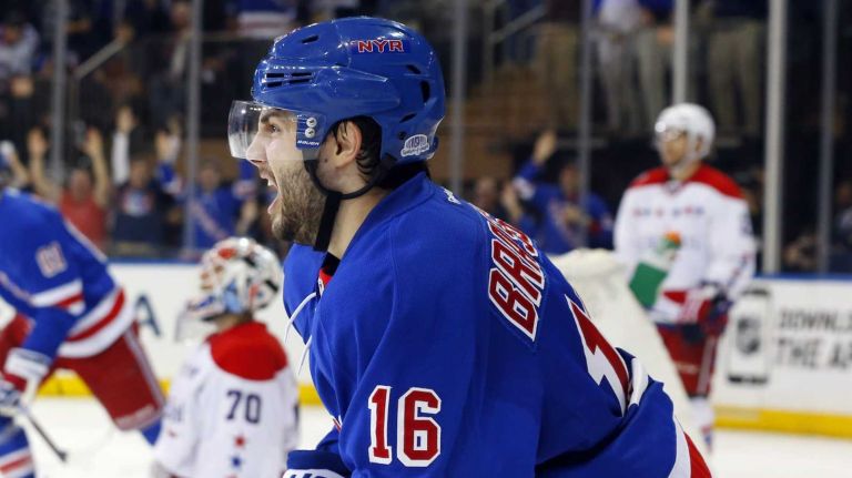Rangers vs. Capitals: Game 2 of round 2 of Stanley Cup playoffs 23 Derick Brassard #16 of the New York Rangers celebrates his third-period goal against Braden Holtby #70 of the Washington Capitals during Game 2 of the Eastern Conference semifinals at Madison Square Garden on Saturday, May 2, 2015.