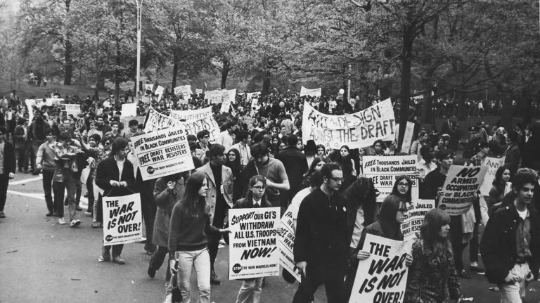 Anti-war demonstrators parade down 5th Avenue towards Sheep Meadow in Central Park. (April 27, 1968)