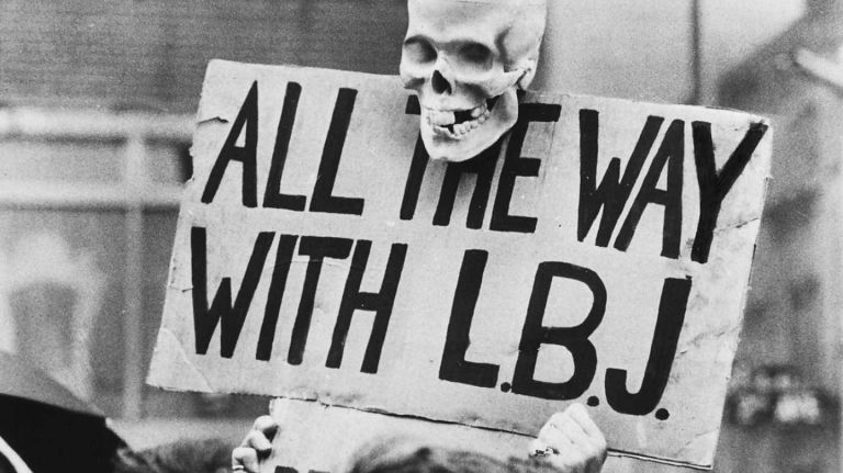 An anti-Vietnam sign being carried by a demonstrator in the crowd at peace march at the United Nations. (April 15, 1967)