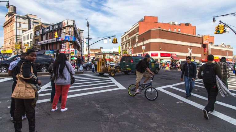 Pedestrians crowd the hub at 149th St and 3rd Ave in the Melrose neighborhood in the Bronx on April 15, 2015. 