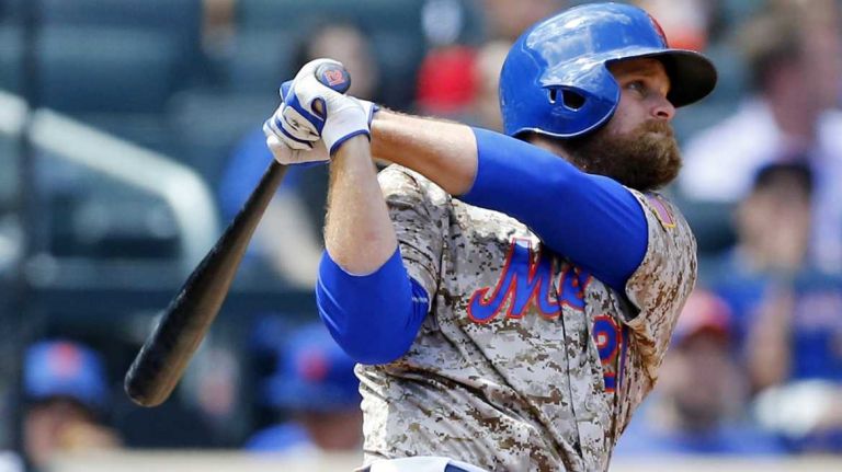 Lucas Duda of the Mets follows through on a fourth-inning home run against the Chicago Cubs at Citi Field on Monday, Aug. 18, 2014.